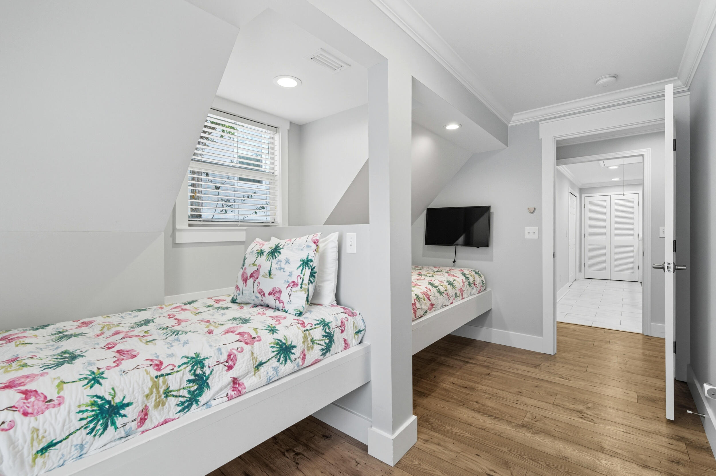 144 Hickory Street Santa Rosa Beach, FL 32459 - Photo 29 of 60 a bedroom with a bed and flat screen tv