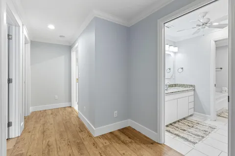 a bedroom with a bed and a chair