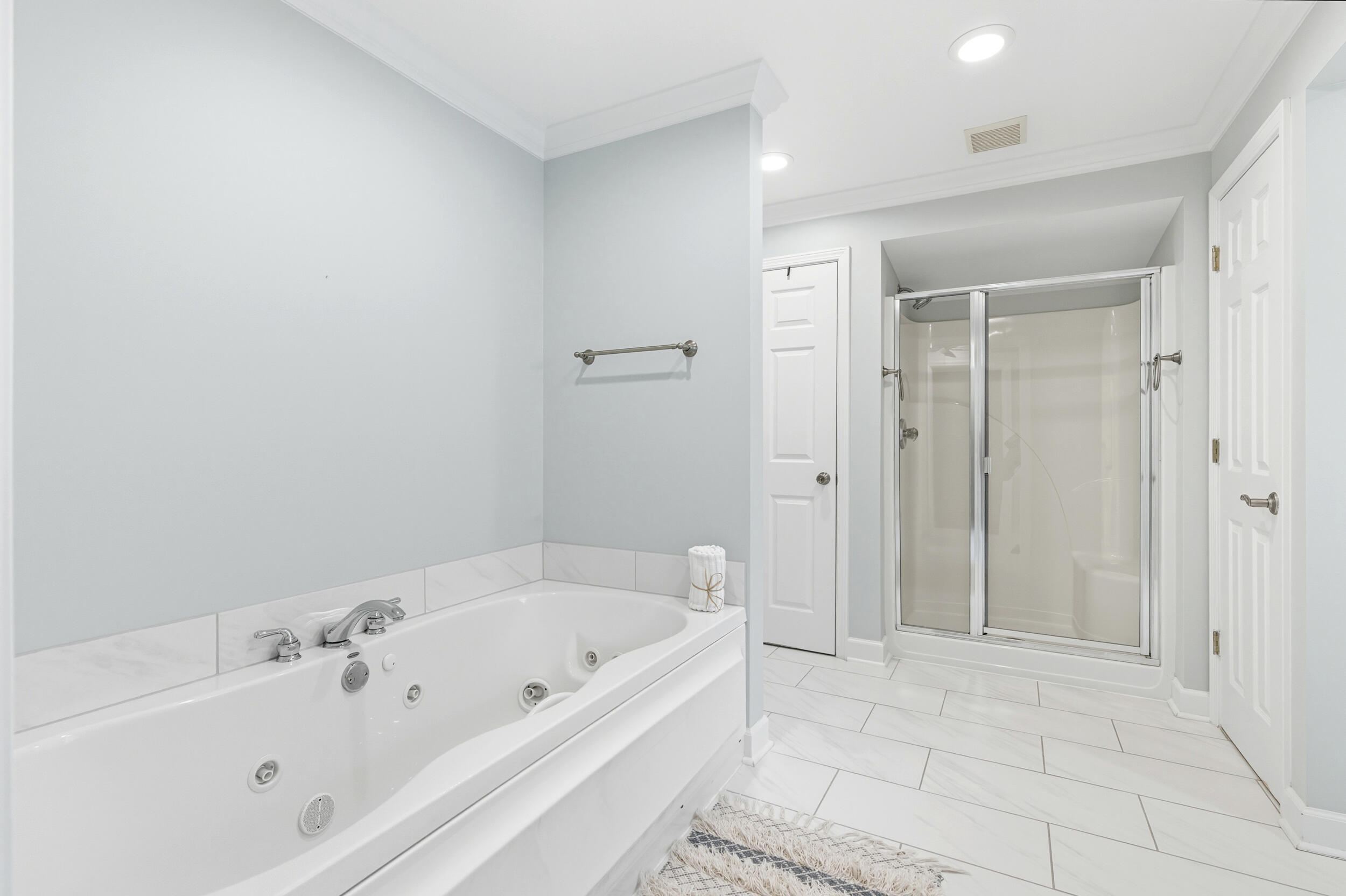 144 Hickory Street Santa Rosa Beach, FL 32459 - Photo 34 of 60 a white bath tub sitting in a bathroom