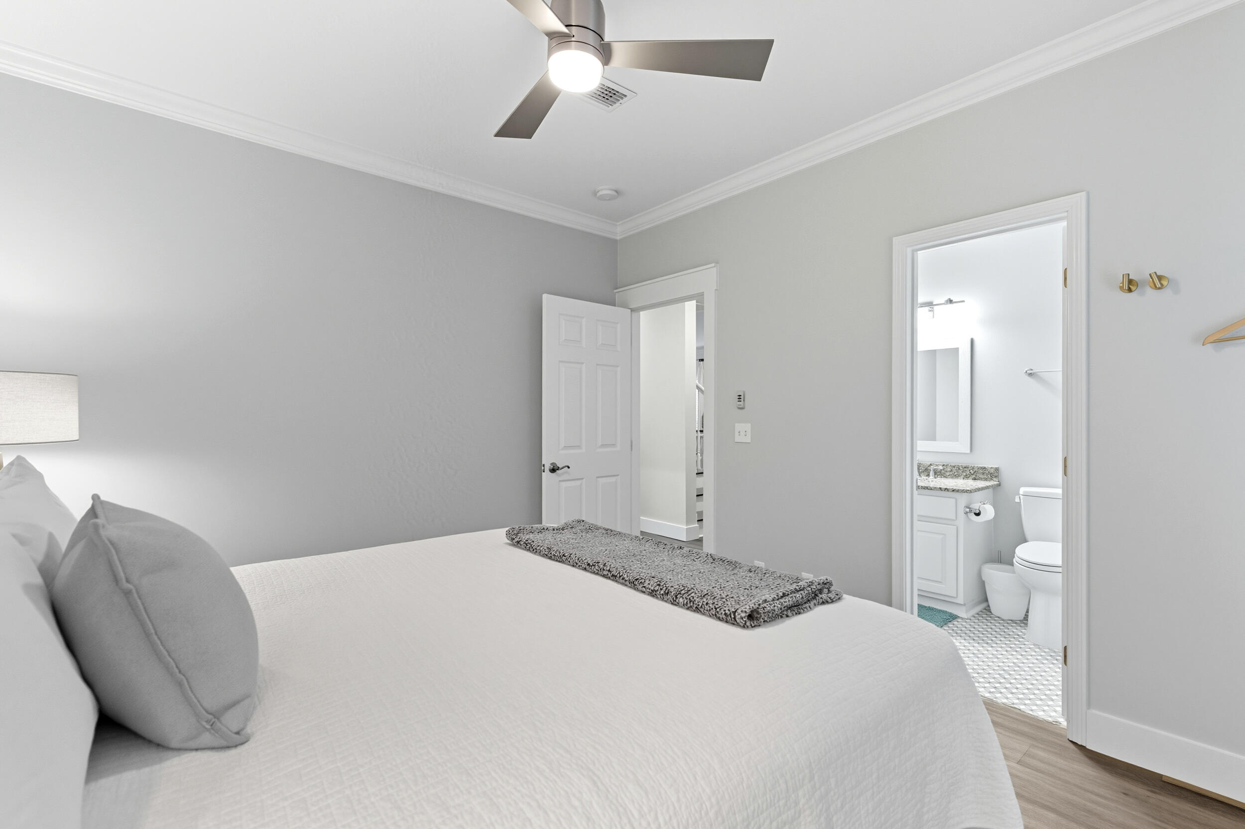 144 Hickory Street Santa Rosa Beach, FL 32459 - Photo 35 of 60 a bedroom with a bed and a chair