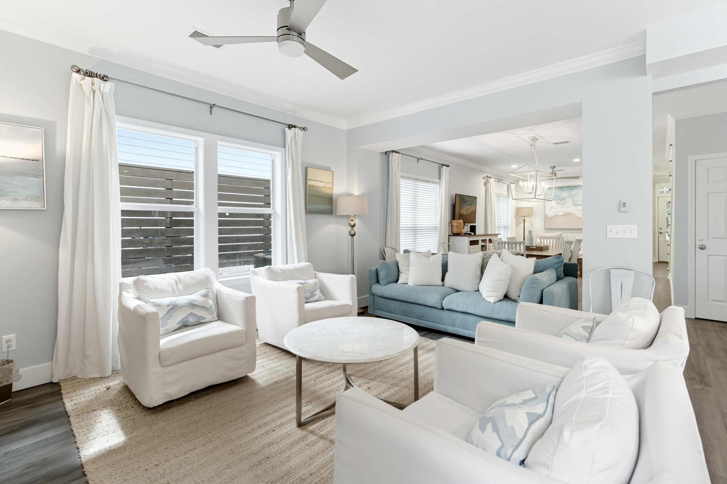 144 Hickory Street Santa Rosa Beach, FL 32459 - Photo 4 of 60 a living room with furniture and a large window