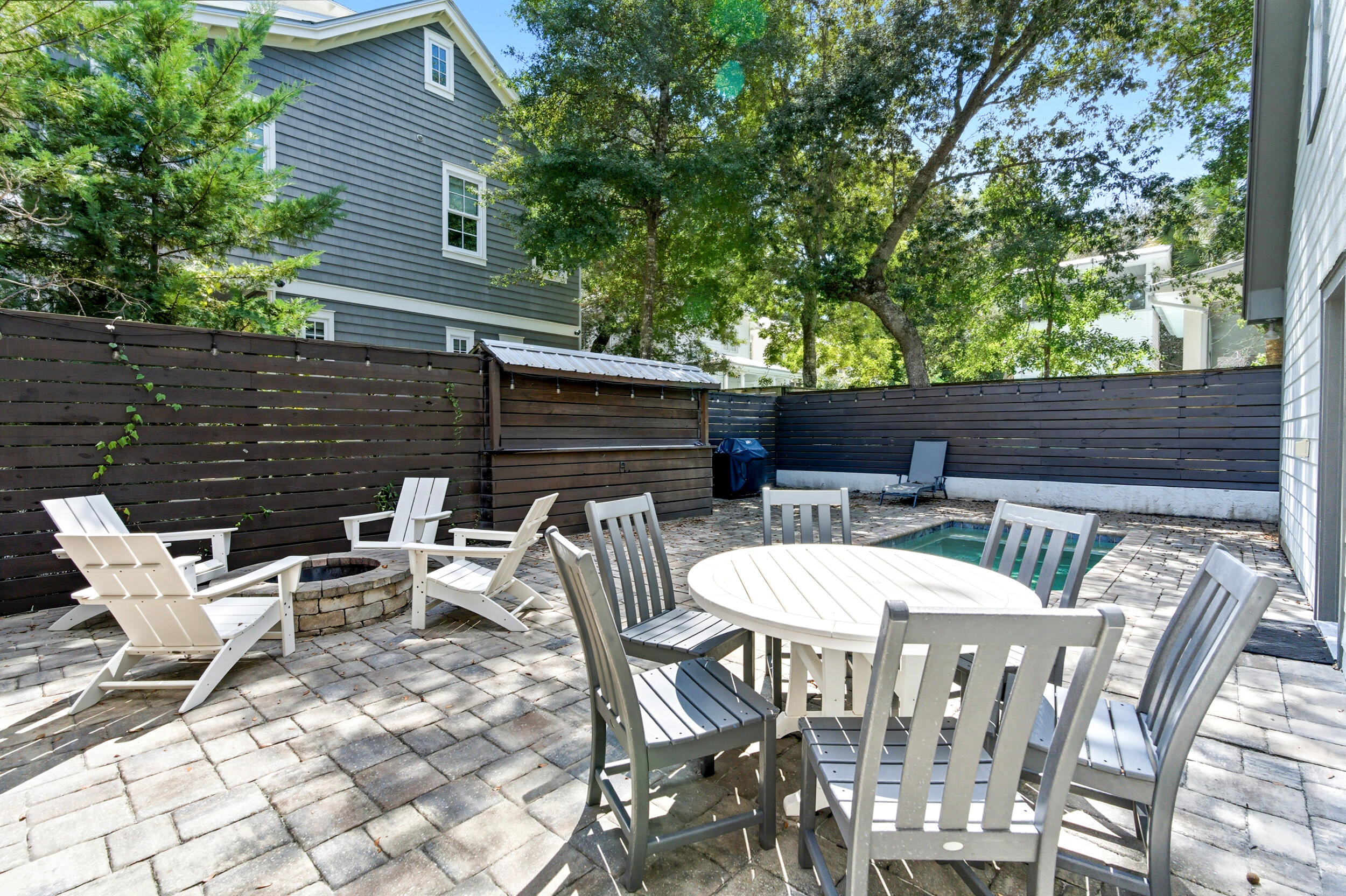 144 Hickory Street Santa Rosa Beach, FL 32459 - Photo 43 of 60 a view of an outdoor space with a table and chairs