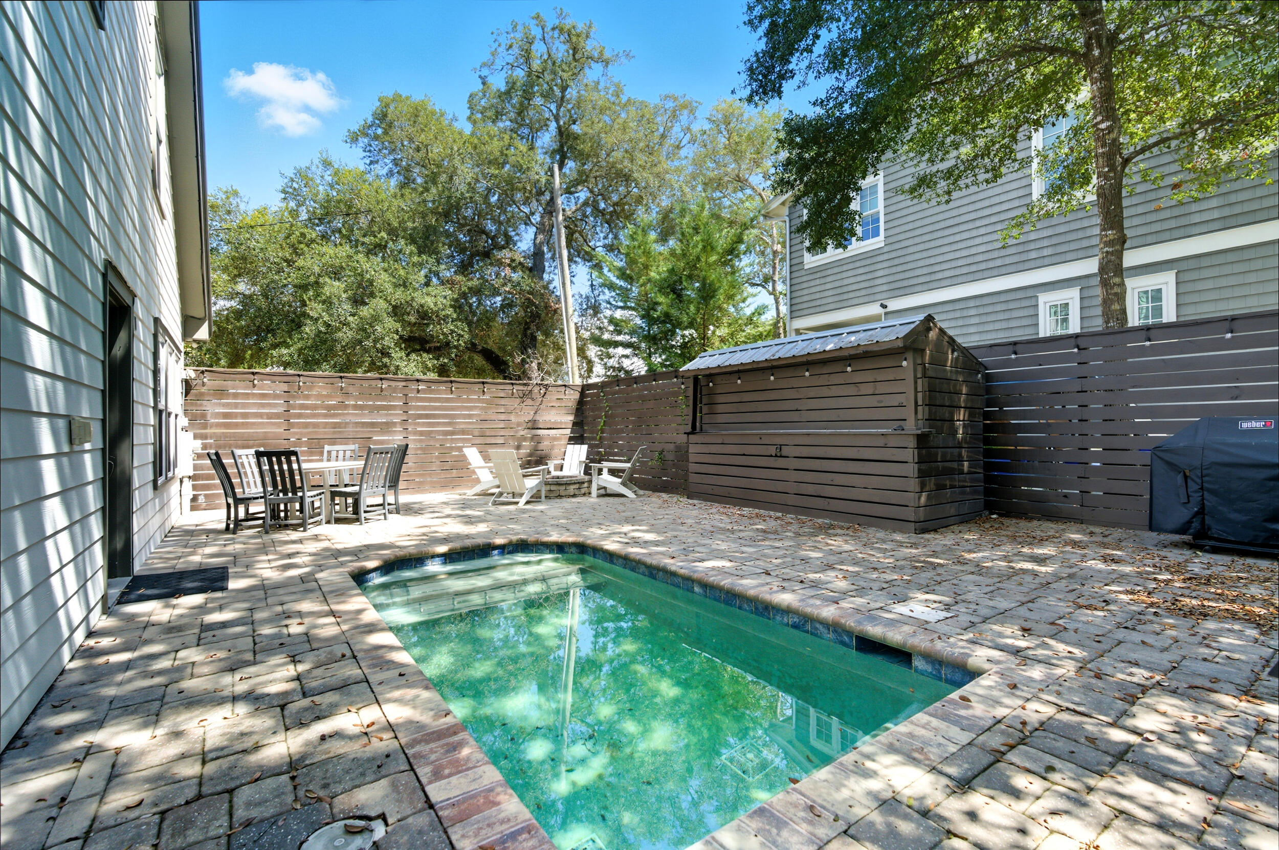 144 Hickory Street Santa Rosa Beach, FL 32459 - Photo 47 of 60 a view of a backyard with sitting area