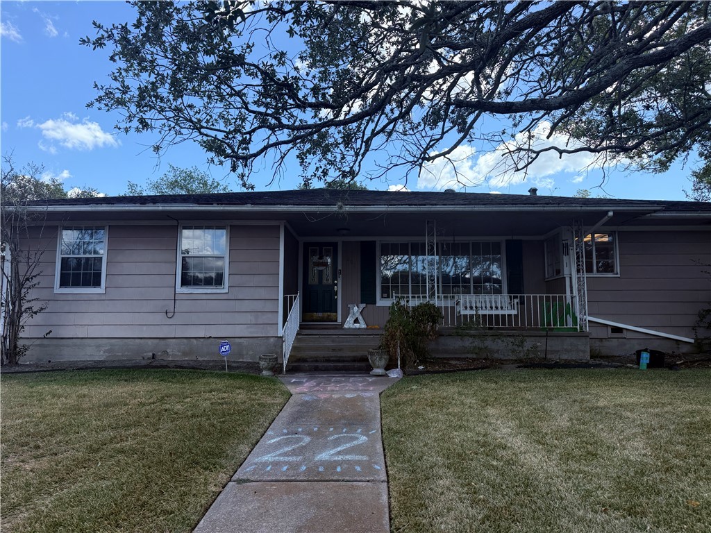 900 Winding Road College Station, TX 77840 - Photo 1 of 6 a view of a house with a garden