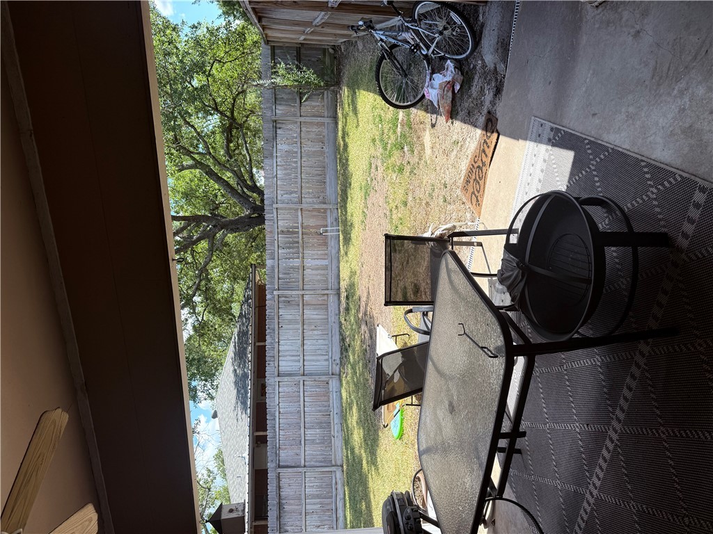 900 Winding Road College Station, TX 77840 - Photo 4 of 6 a view of backyard with swimming pool and outdoor seating
