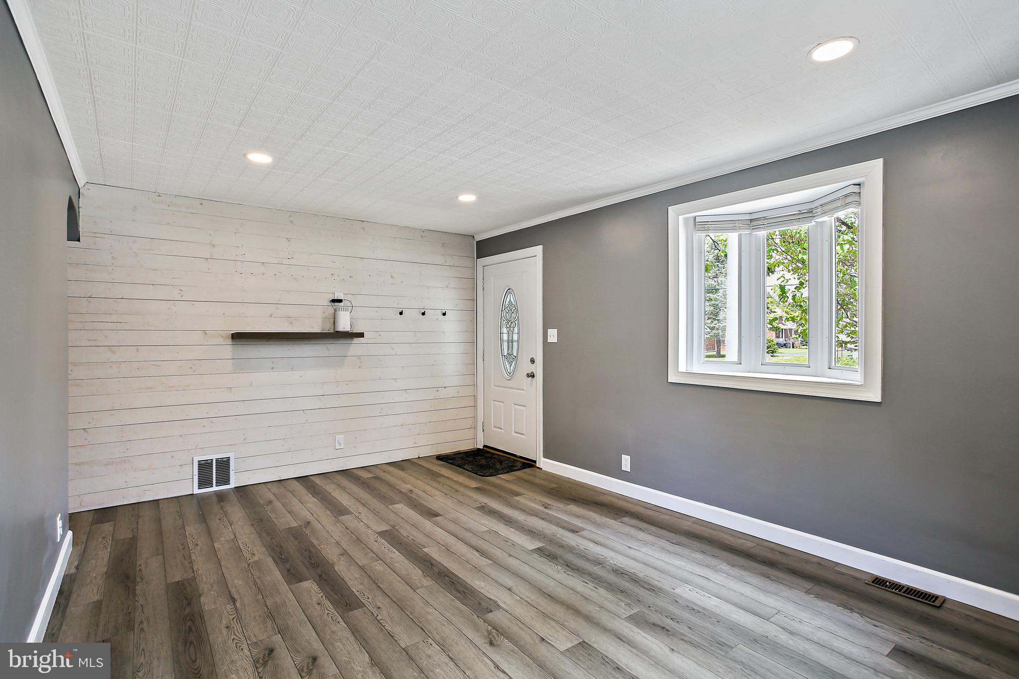 301 Townsend Road Essex, MD 21221 - Photo 11 of 33 a view of a livingroom with wooden floor