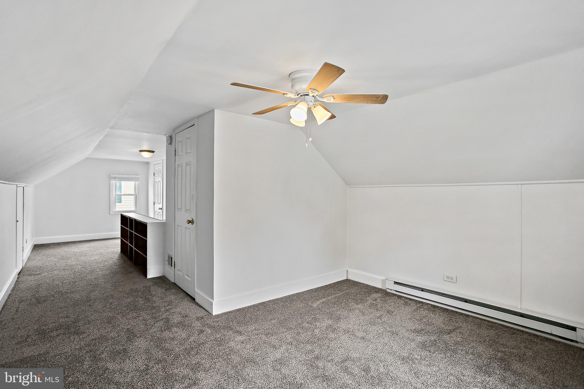 301 Townsend Road Essex, MD 21221 - Photo 18 of 33 wooden floor in an empty room with a window