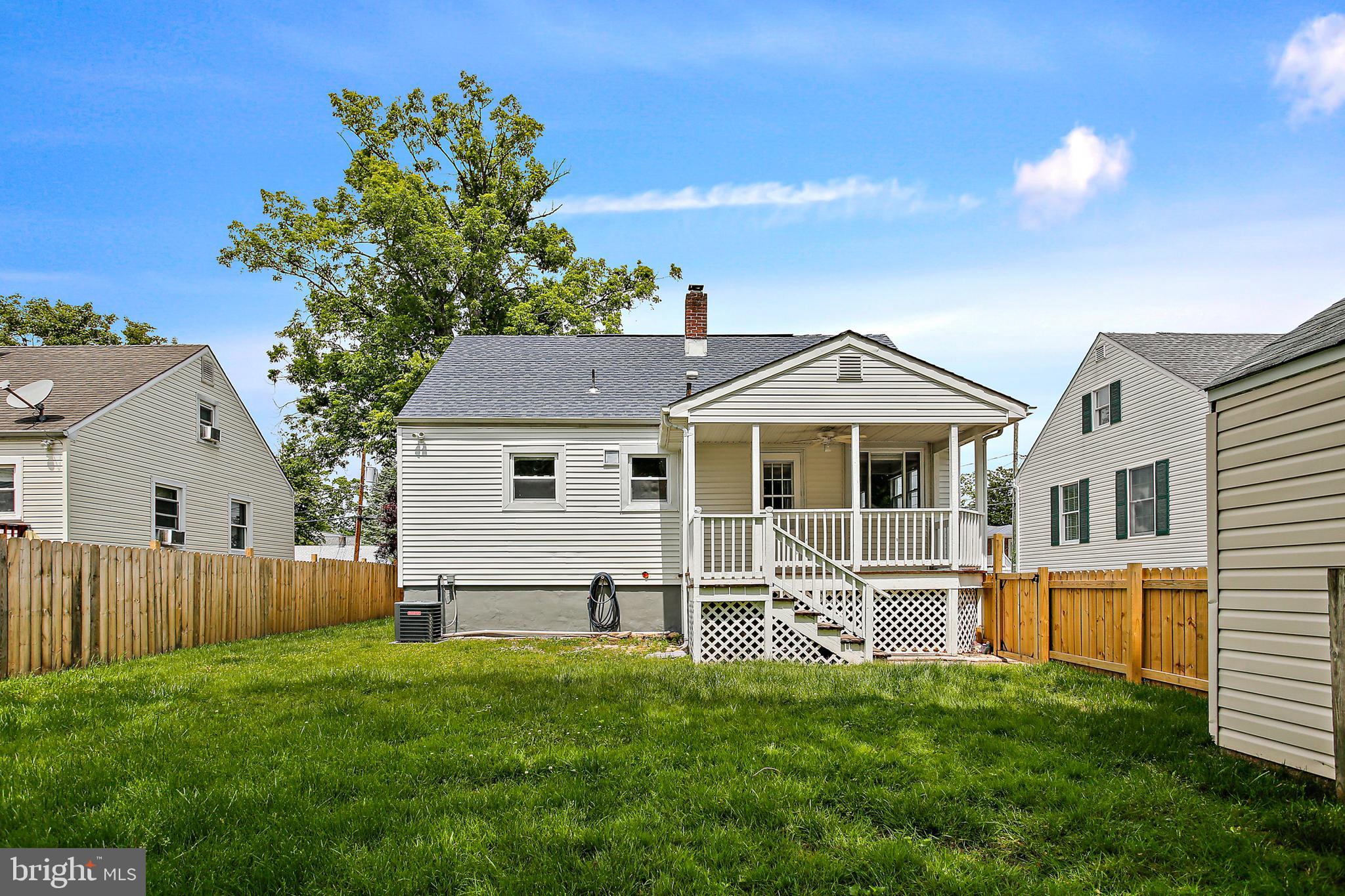 301 Townsend Road Essex, MD 21221 - Photo 30 of 33 a front view of a house with a yard