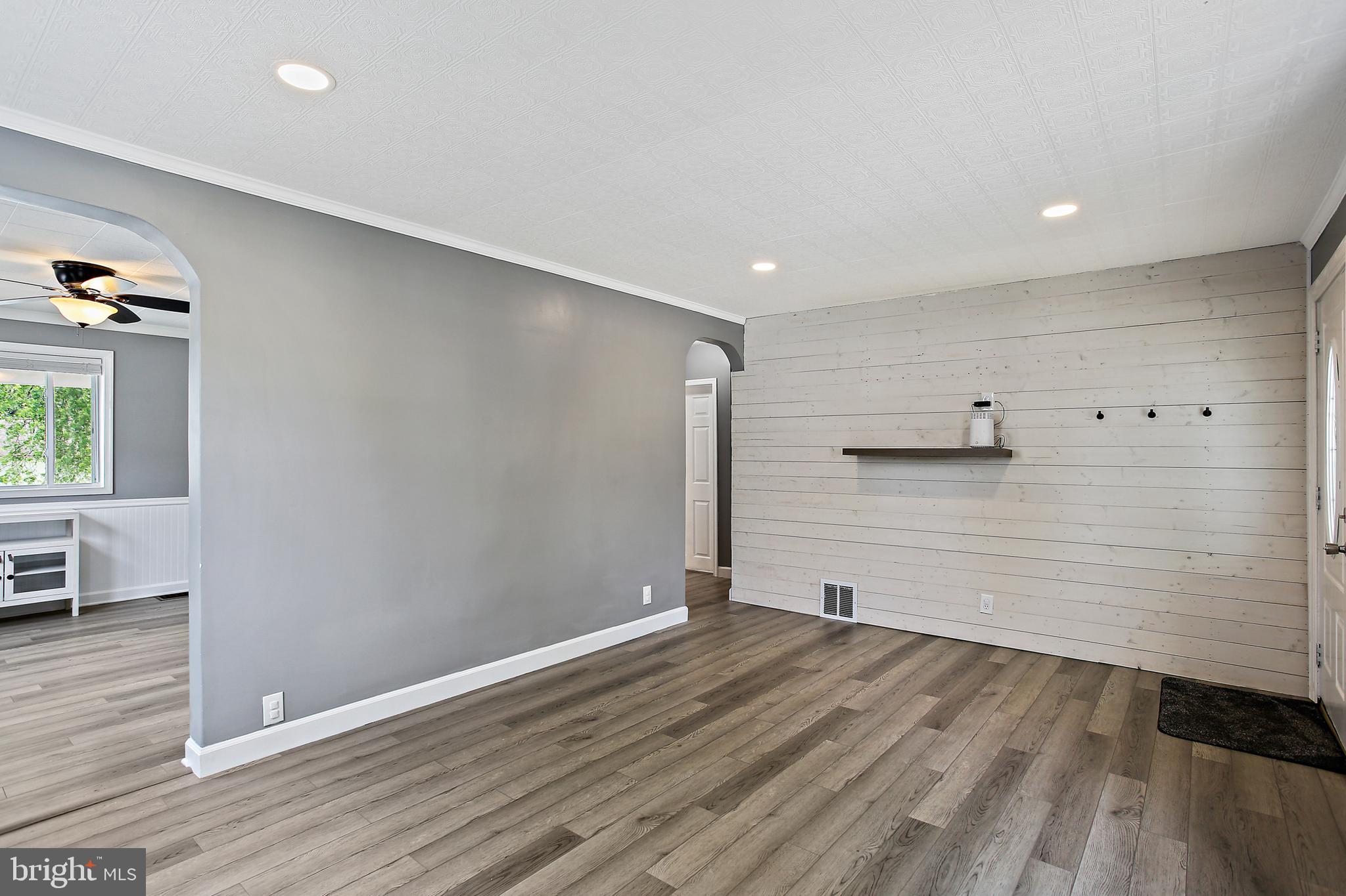 301 Townsend Road Essex, MD 21221 - Photo 10 of 33 a view of empty room with wooden floor