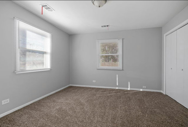 547 Regent Road University Park, IL 60484 - Photo 9 of 14 an empty room with windows