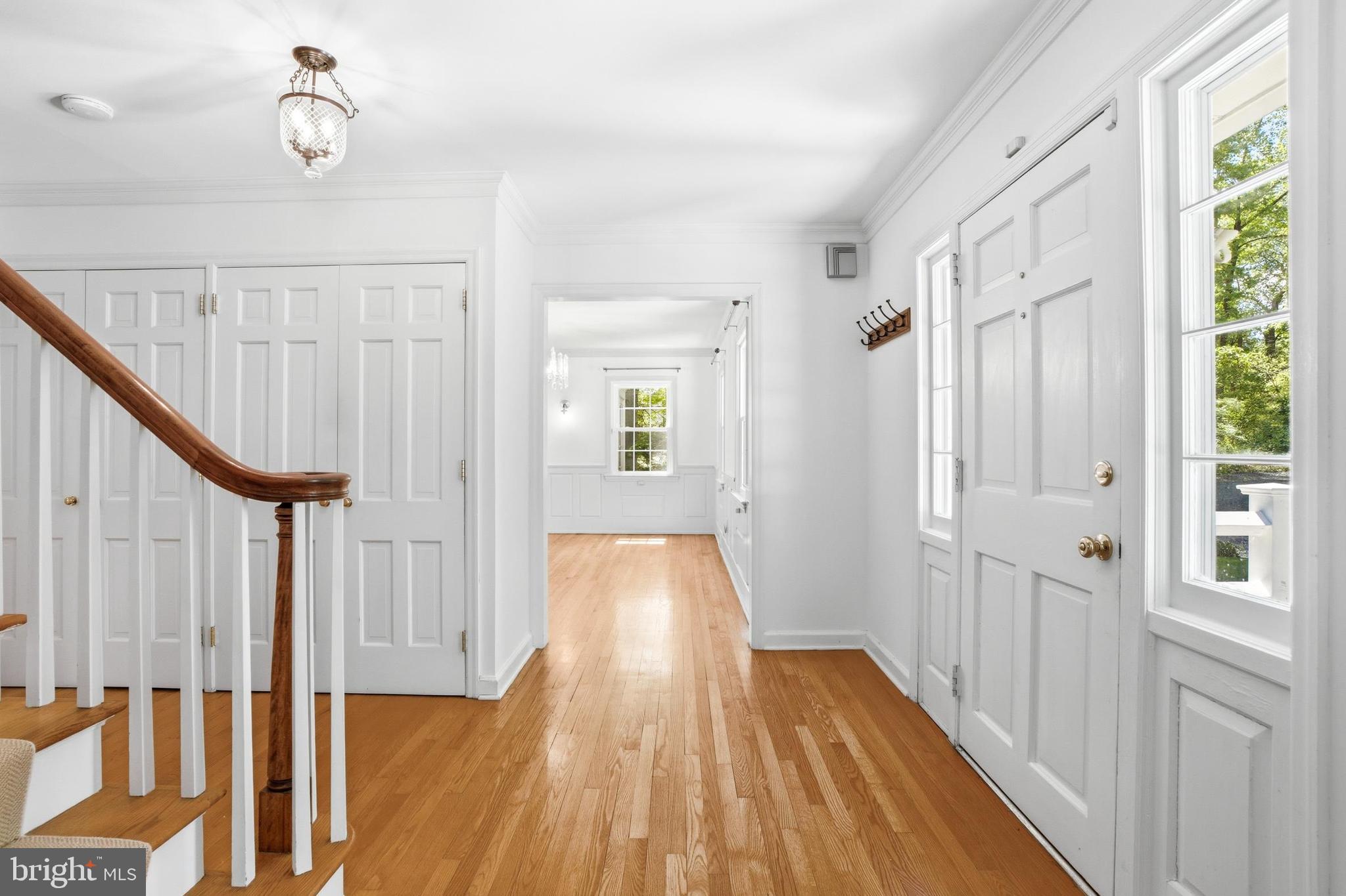 4511 Province Line Road Princeton, NJ 08540 - Photo 19 of 34 a view of a hallway with wooden floor and staircase