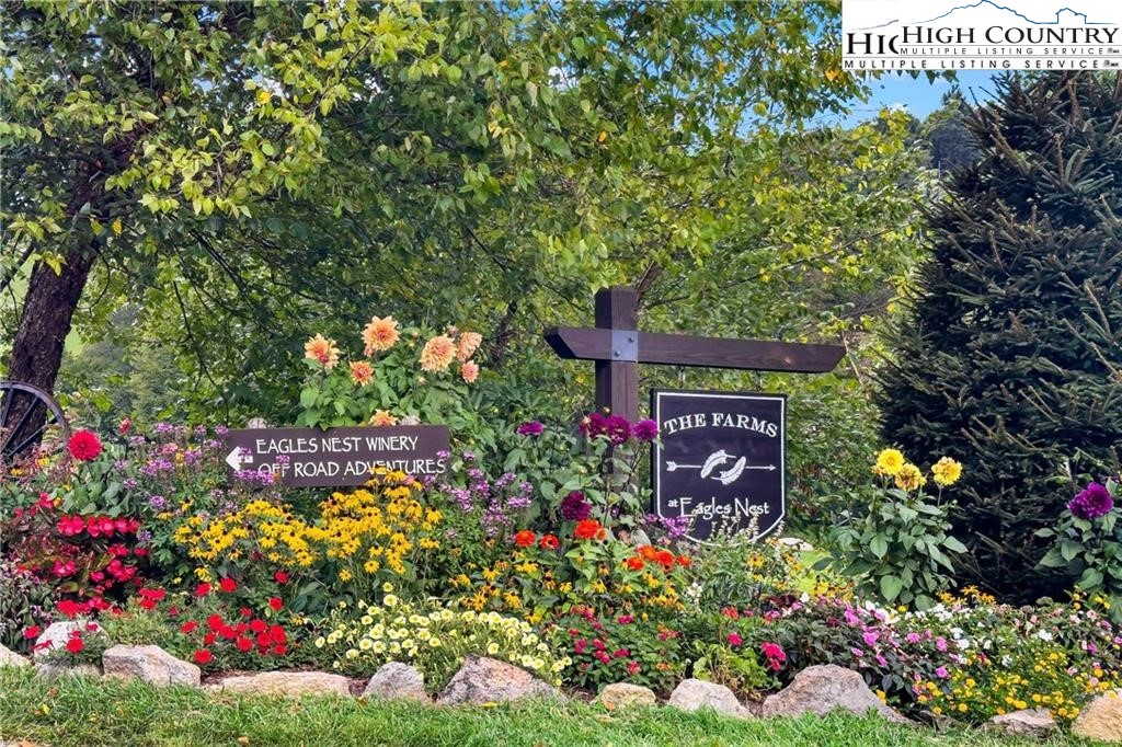 80 Lands End Trail Banner Elk, NC 28604 - Photo 29 of 31 a sign that is in front of flowers