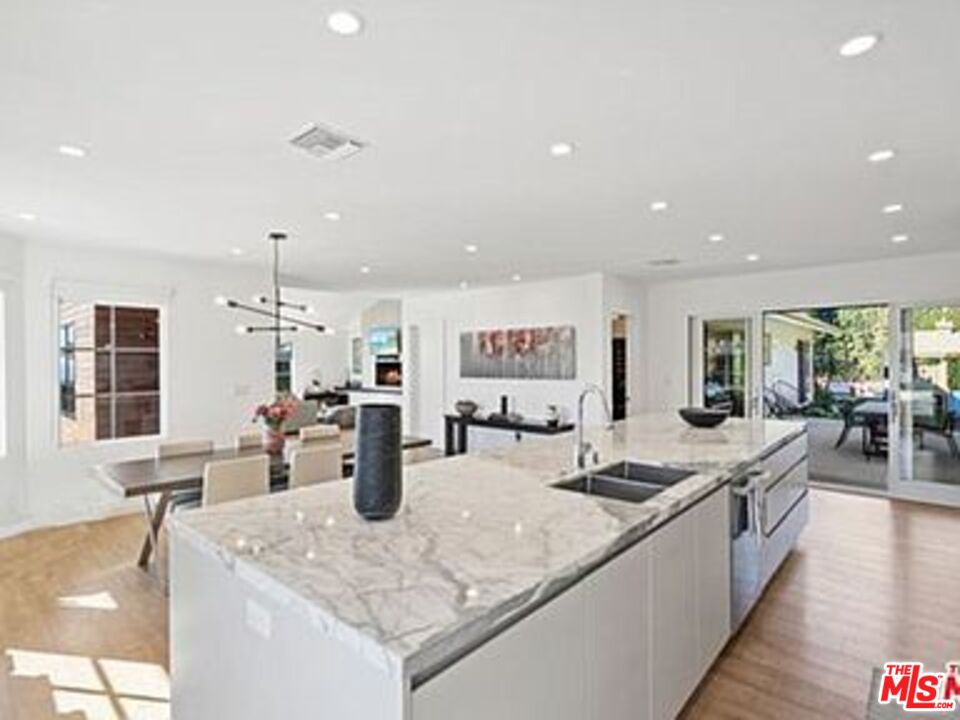 Roca Chica Drive Malibu, CA 90265 - Photo 12 of 34 a kitchen with counter top space and living room