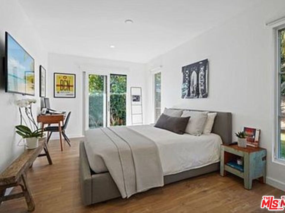 Roca Chica Drive Malibu, CA 90265 - Photo 23 of 34 a bedroom with a bed and a couch