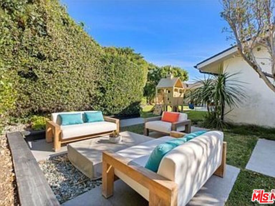 Roca Chica Drive Malibu, CA 90265 - Photo 28 of 34 a outdoor living space with furniture and city view