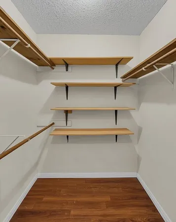 a view of a room with racks on the wall