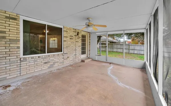 wooden floor and window in an empty room