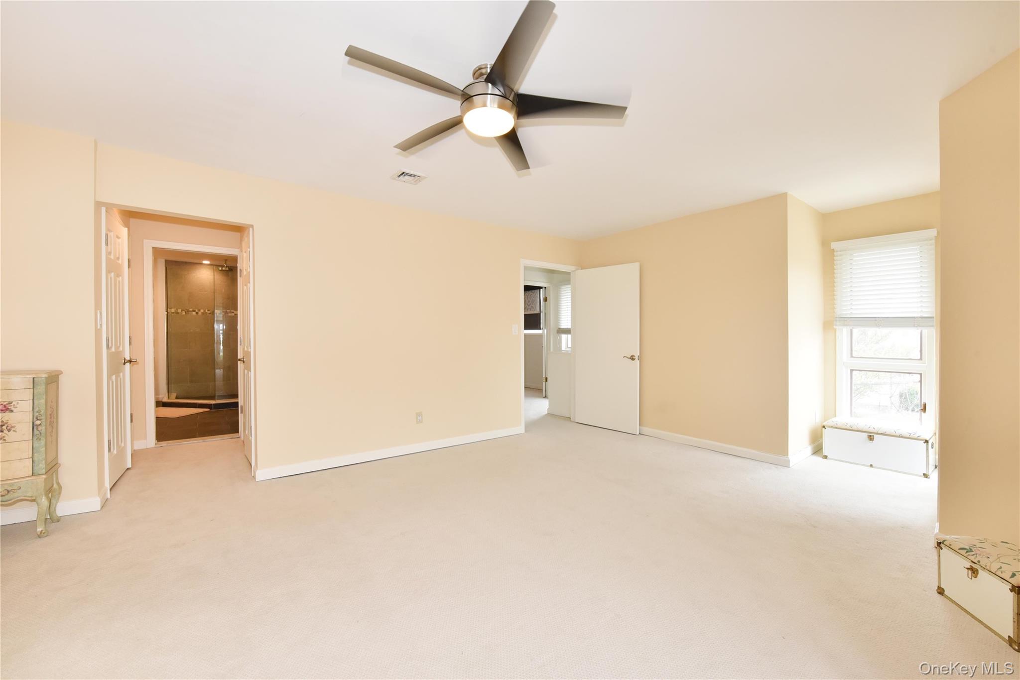 142 I U Willets Road Albertson, NY 11507 - Photo 20 of 32 a view of an empty room with a window