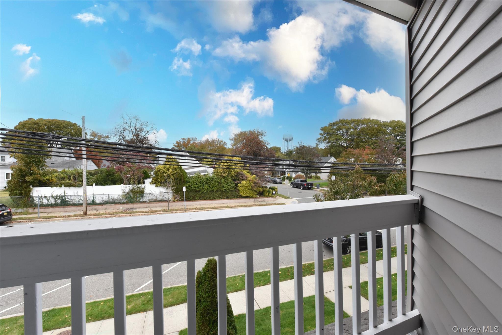 142 I U Willets Road Albertson, NY 11507 - Photo 21 of 32 a view of a city from a balcony