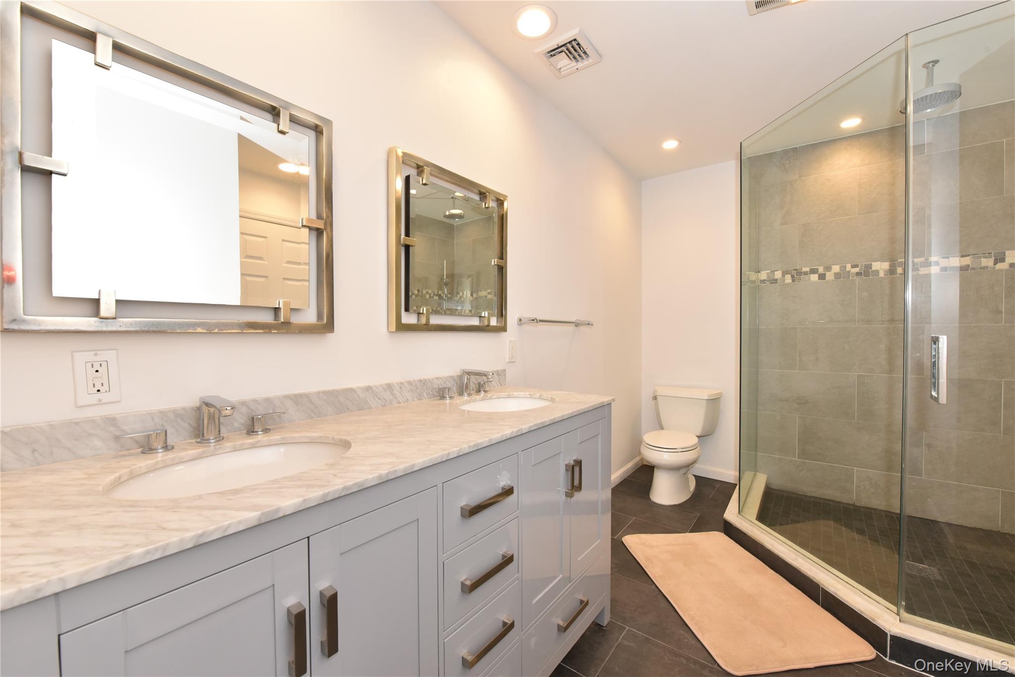 142 I U Willets Road Albertson, NY 11507 - Photo 23 of 32 a bathroom with a granite countertop sink mirror and double