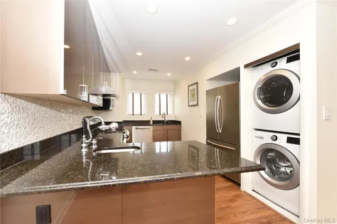 a view of kitchen with wooden floor