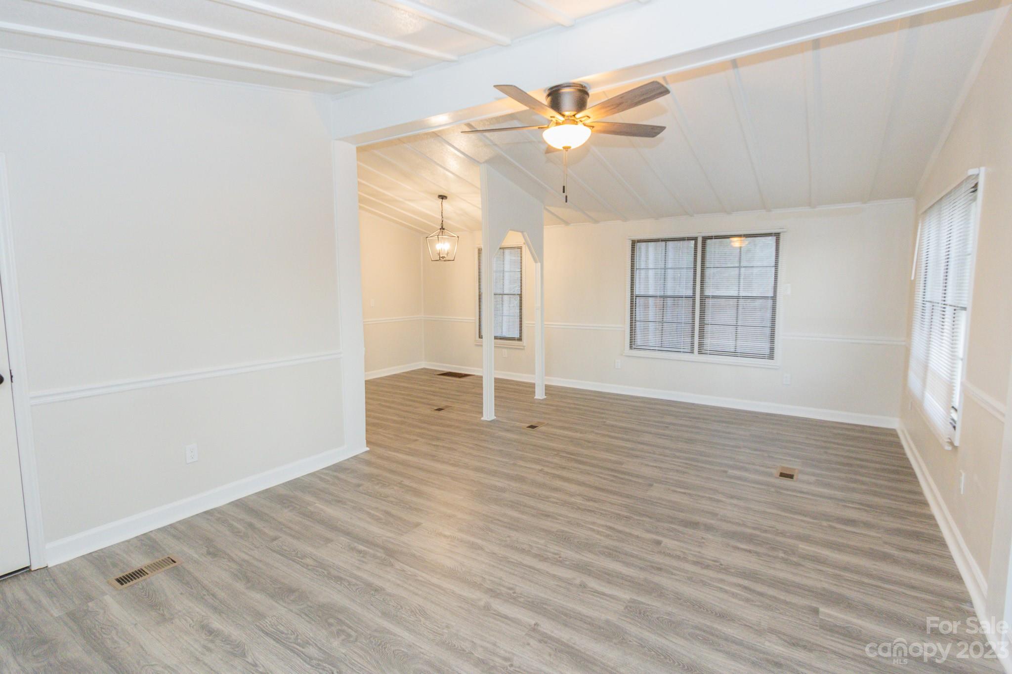 4634 Pleasant Road Heath Springs, SC 29058 - Photo 29 of 43 wooden floor in an empty room with a window