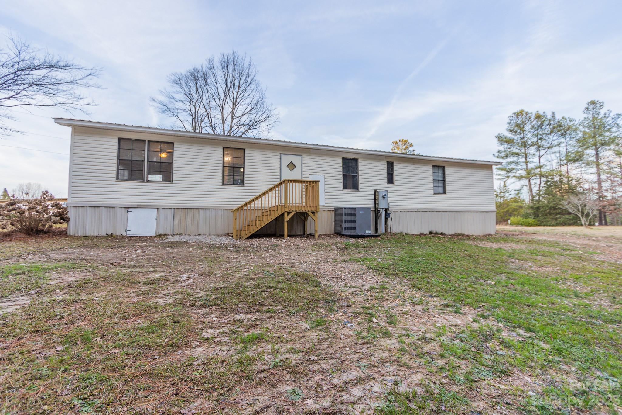 4634 Pleasant Road Heath Springs, SC 29058 - Photo 37 of 43 a view of a house with a yard
