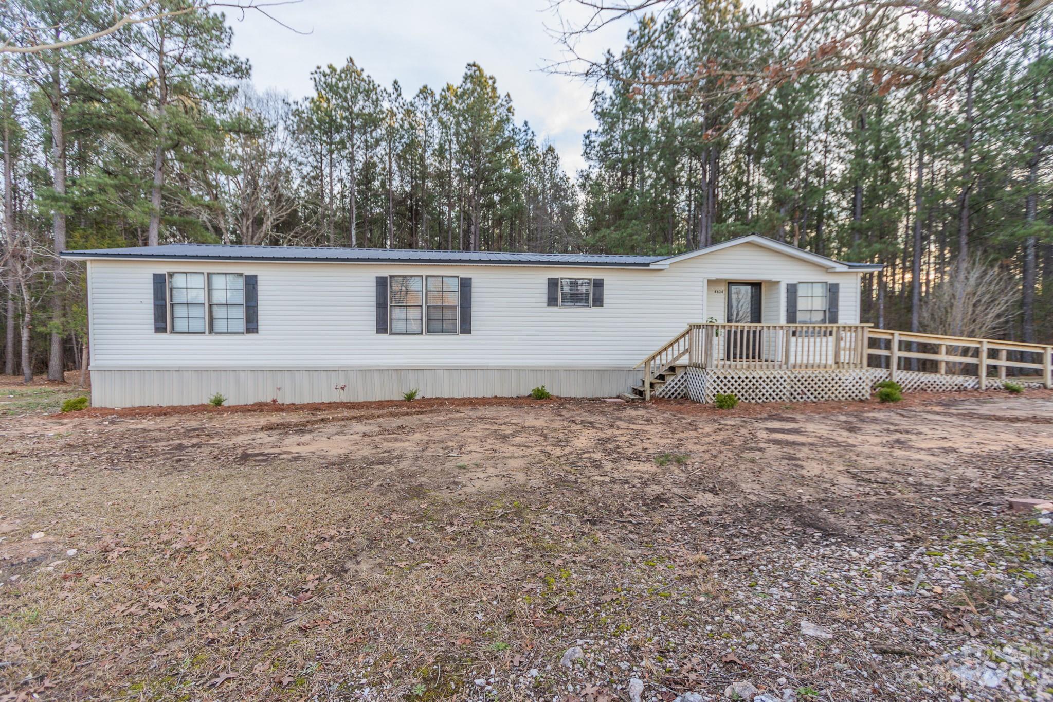 4634 Pleasant Road Heath Springs, SC 29058 - Photo 43 of 43 front view of a house with a yard