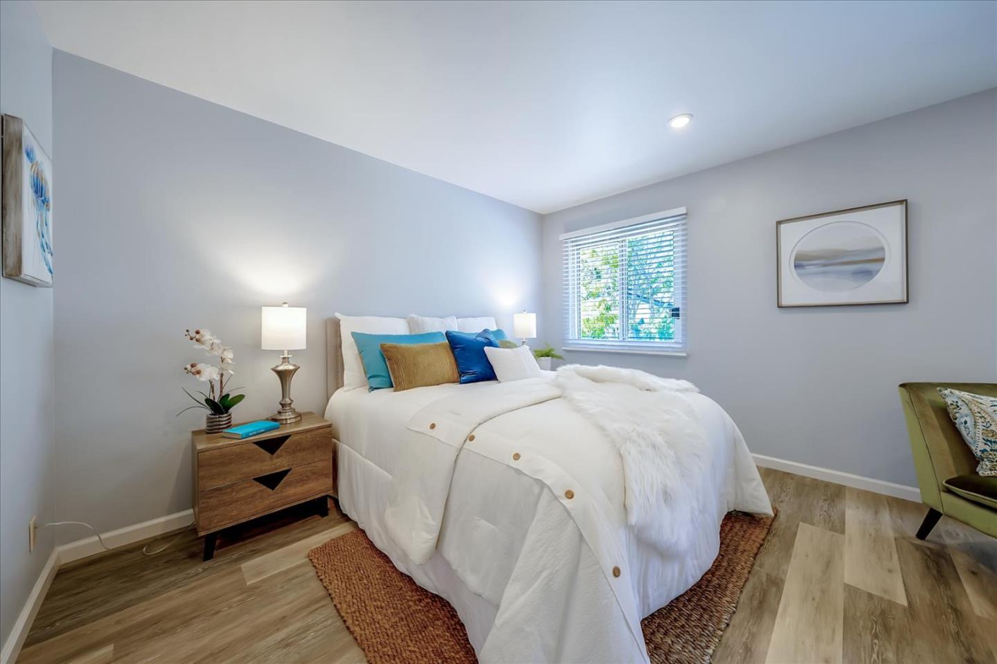 1126 Cherry Avenue, Unit 16 San Bruno, CA 94066 - Photo 12 of 32 a bedroom with a bed and a desk