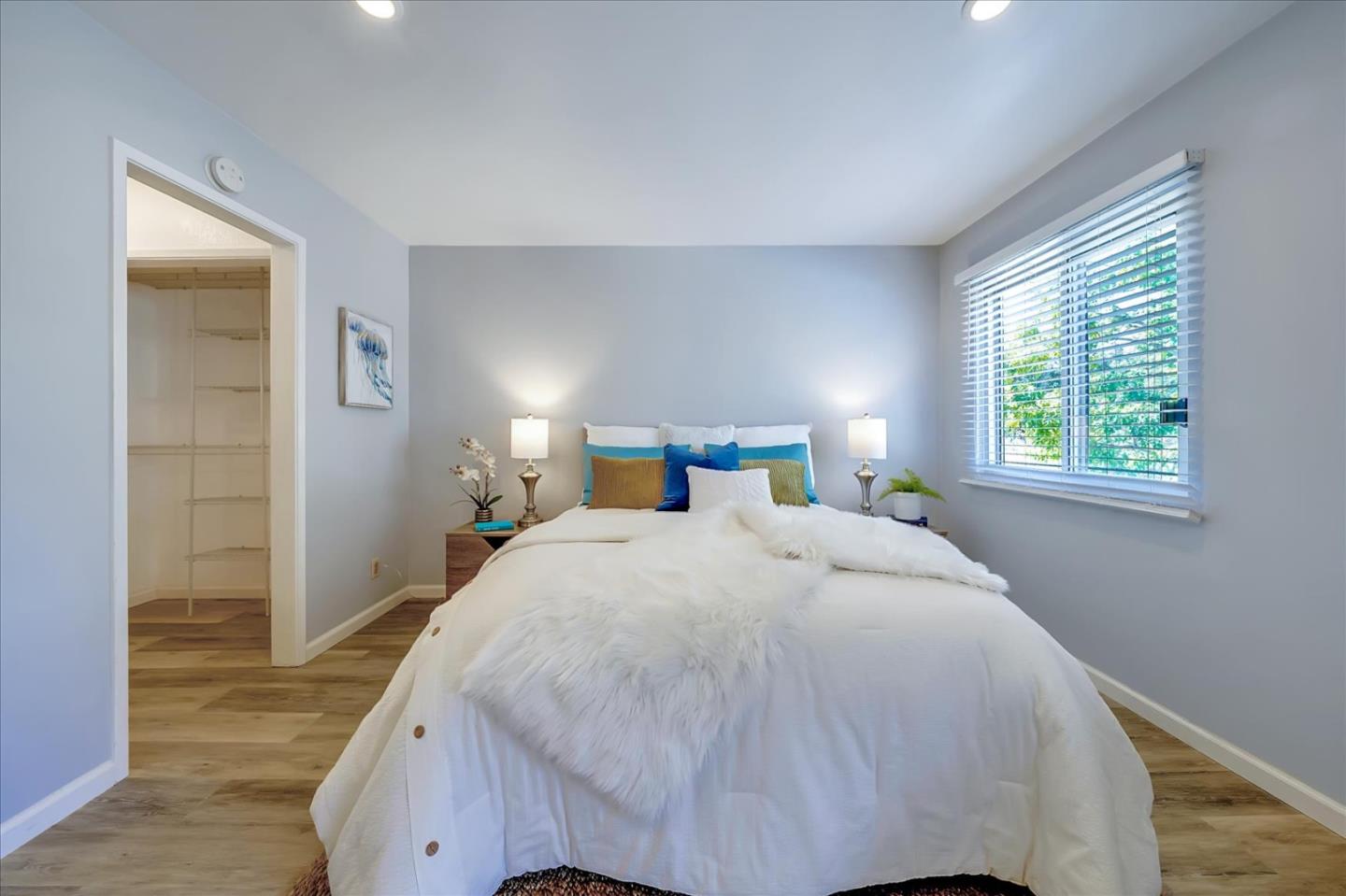 1126 Cherry Avenue, Unit 16 San Bruno, CA 94066 - Photo 13 of 32 a bedroom with a bed and a window