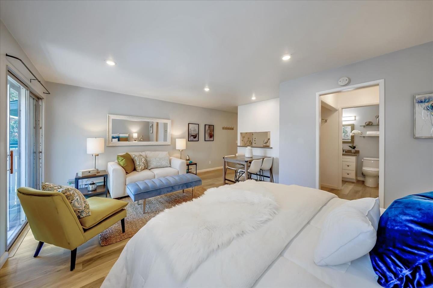 1126 Cherry Avenue, Unit 16 San Bruno, CA 94066 - Photo 15 of 32 a bedroom with furniture and a couch