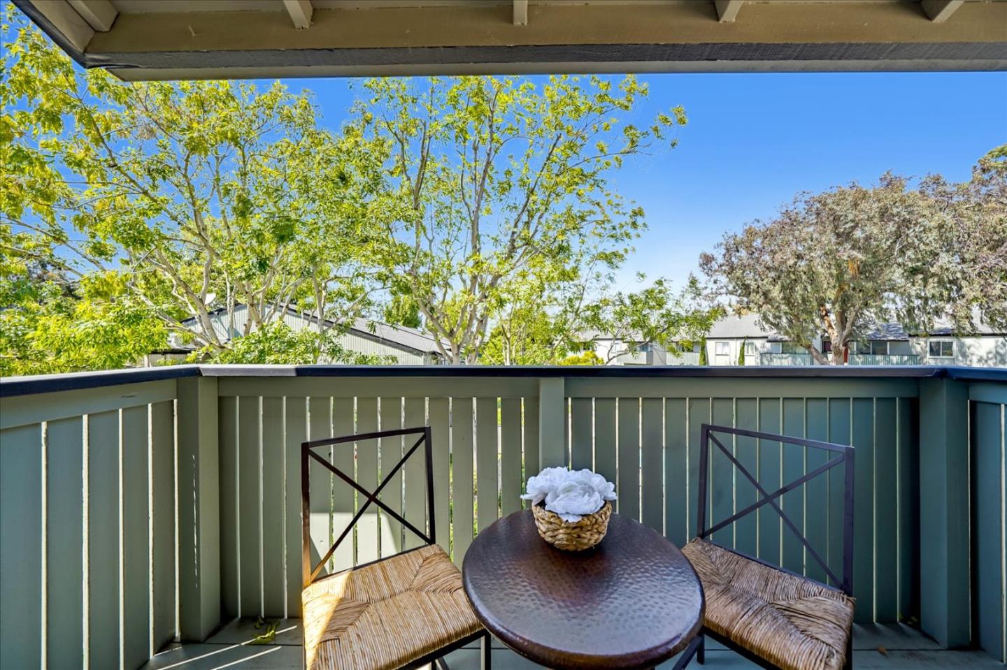 1126 Cherry Avenue, Unit 16 San Bruno, CA 94066 - Photo 20 of 32 a balcony with wooden floor