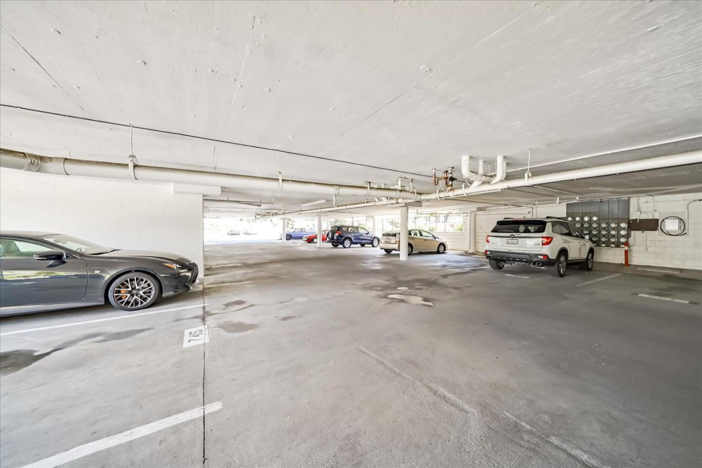 1126 Cherry Avenue, Unit 16 San Bruno, CA 94066 - Photo 22 of 32 a view of parking space with parked cars