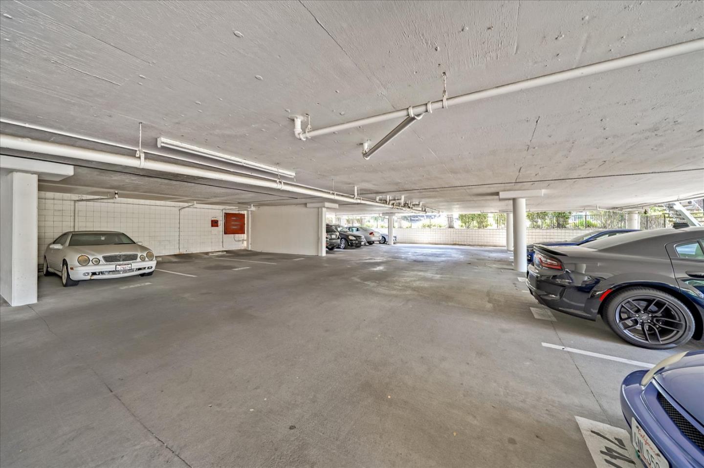 1126 Cherry Avenue, Unit 16 San Bruno, CA 94066 - Photo 23 of 32 a view of a car parking garage