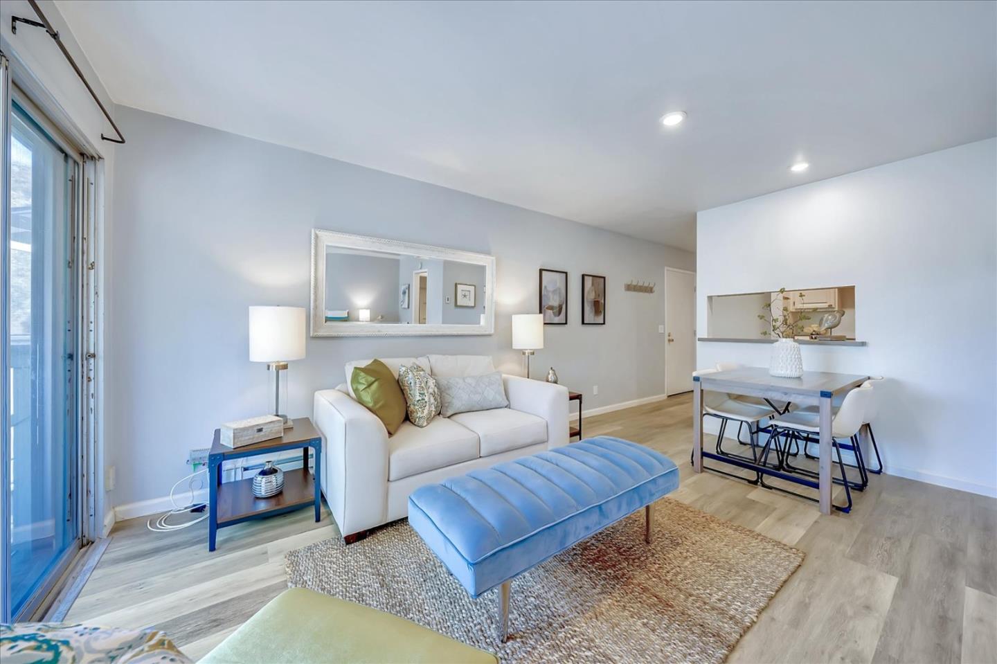 1126 Cherry Avenue, Unit 16 San Bruno, CA 94066 - Photo 9 of 32 a living room with furniture and a wooden floor