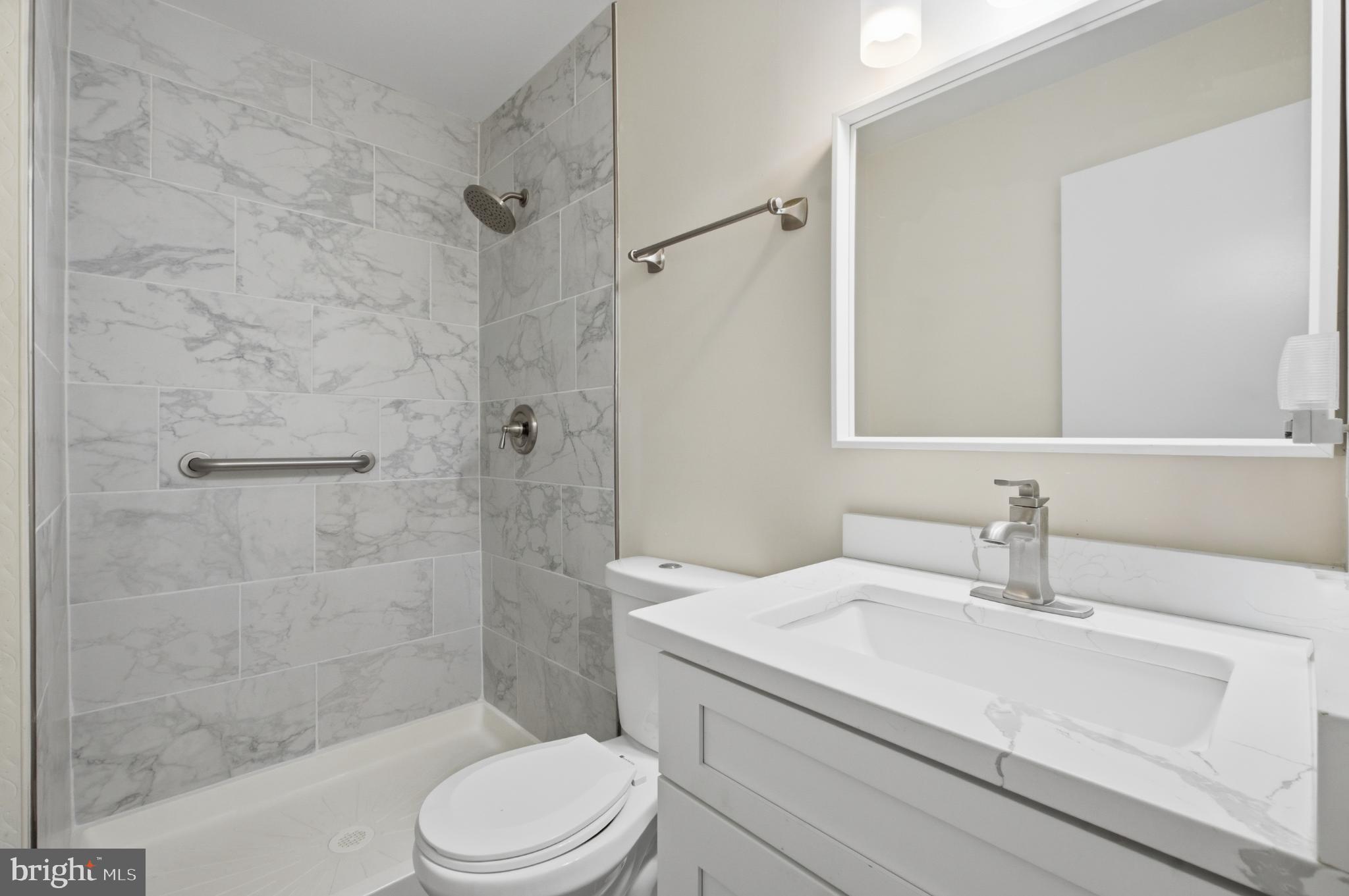 2917 Seminole Road Woodbridge, VA 22192 - Photo 13 of 44 Sleek modern bathroom with elegant finishes.