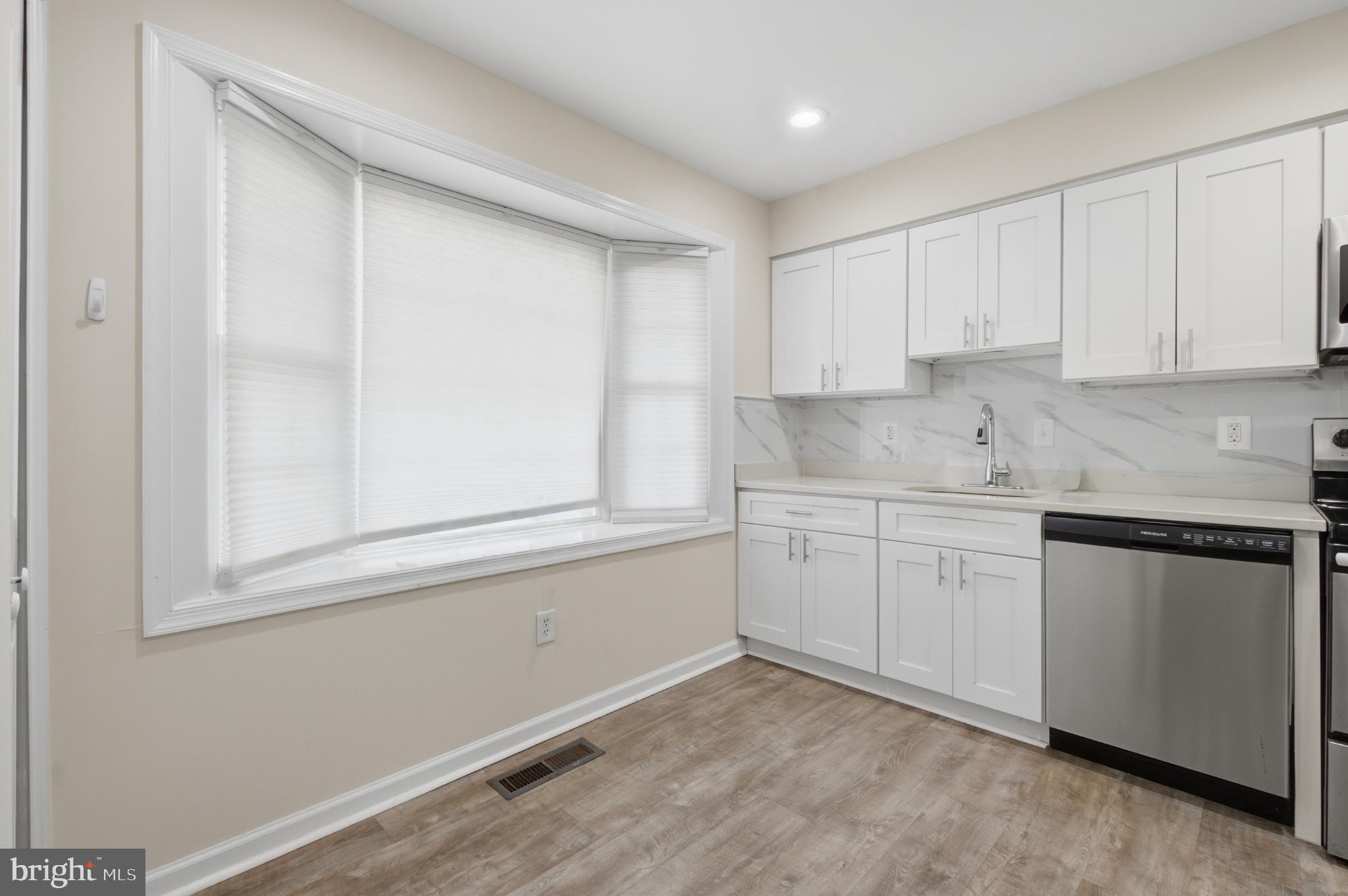 2917 Seminole Road Woodbridge, VA 22192 - Photo 30 of 44 Bright and modern kitchen with sleek finishes.