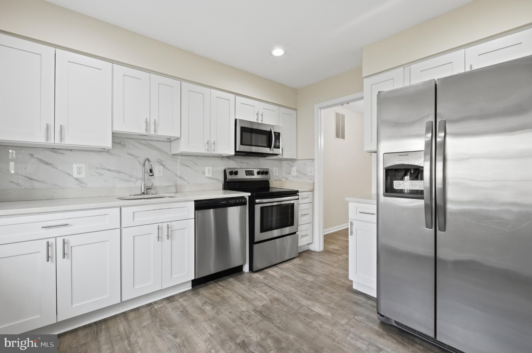 2917 Seminole Road Woodbridge, VA 22192 - Photo 32 of 44 Modern kitchen with sleek appliances.