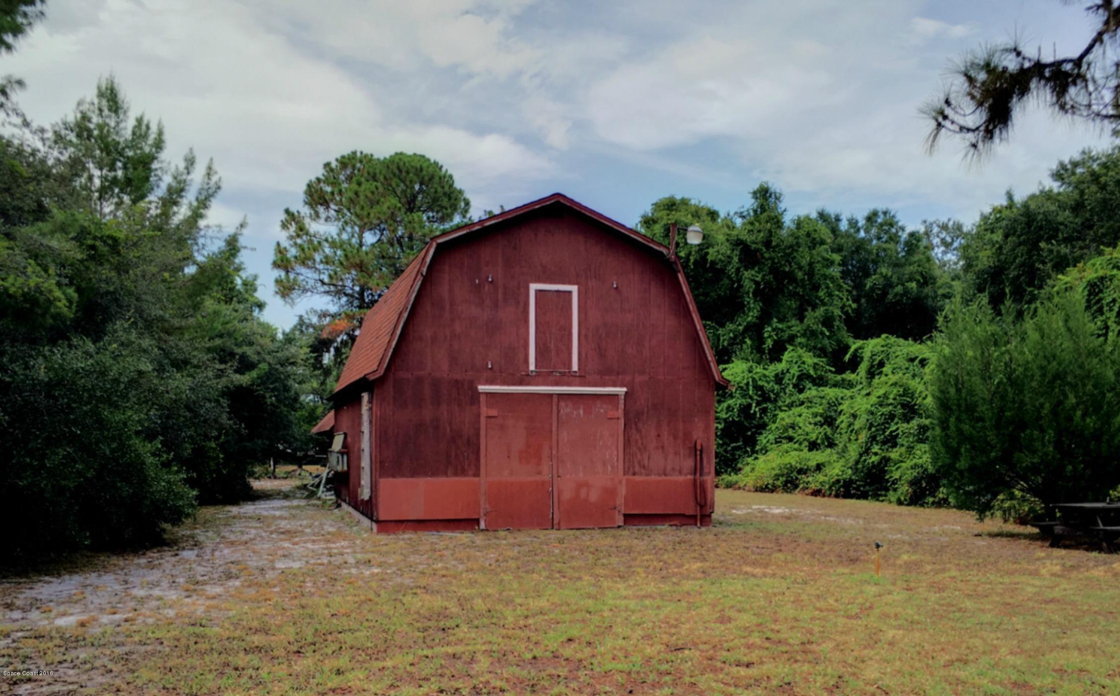 3690 Aurantia Road Mims, FL 32754 - Photo 20 of 29 Storage Barn with loft