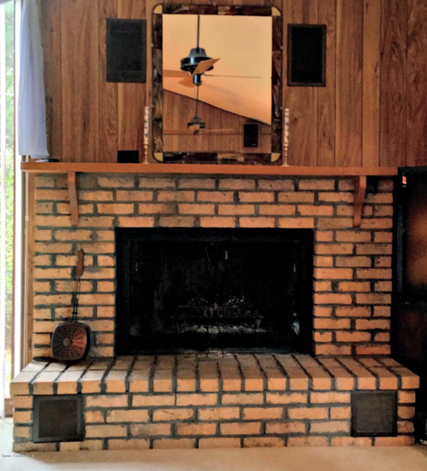 3690 Aurantia Road Mims, FL 32754 - Photo 7 of 29 Living Room Fireplace