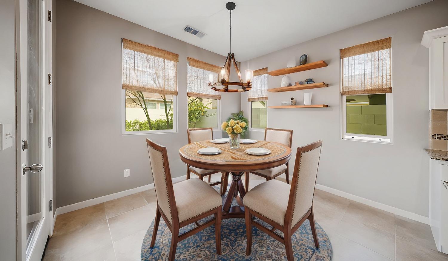 3563 Journey Way Clovis, CA 93619 - Photo 11 of 20 a view of a dining room with furniture window and outside view