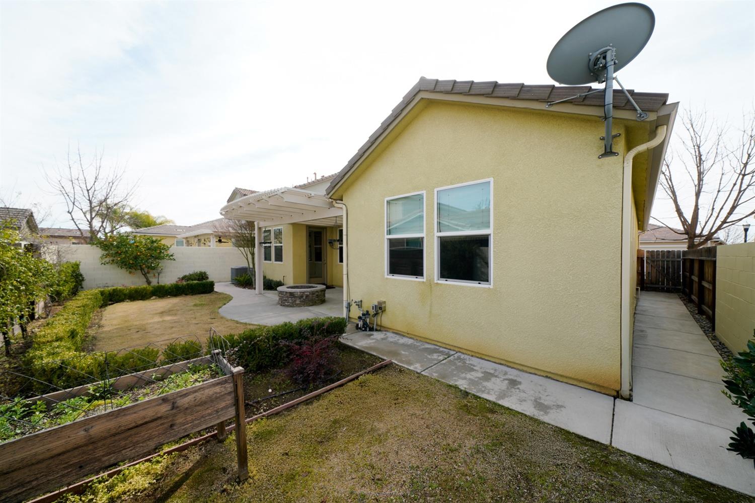 3563 Journey Way Clovis, CA 93619 - Photo 15 of 20 a house view with a backyard space