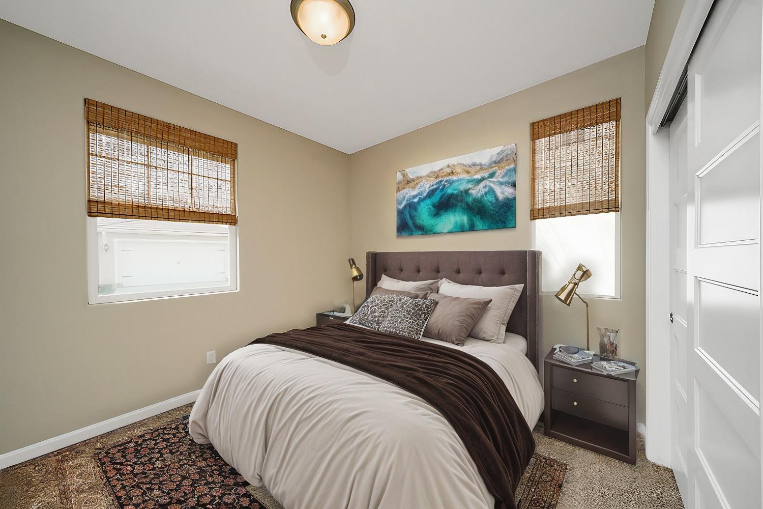 3563 Journey Way Clovis, CA 93619 - Photo 7 of 20 a bedroom with a bed and a window