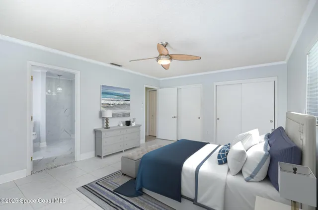 a spacious bedroom with a bed and furniture