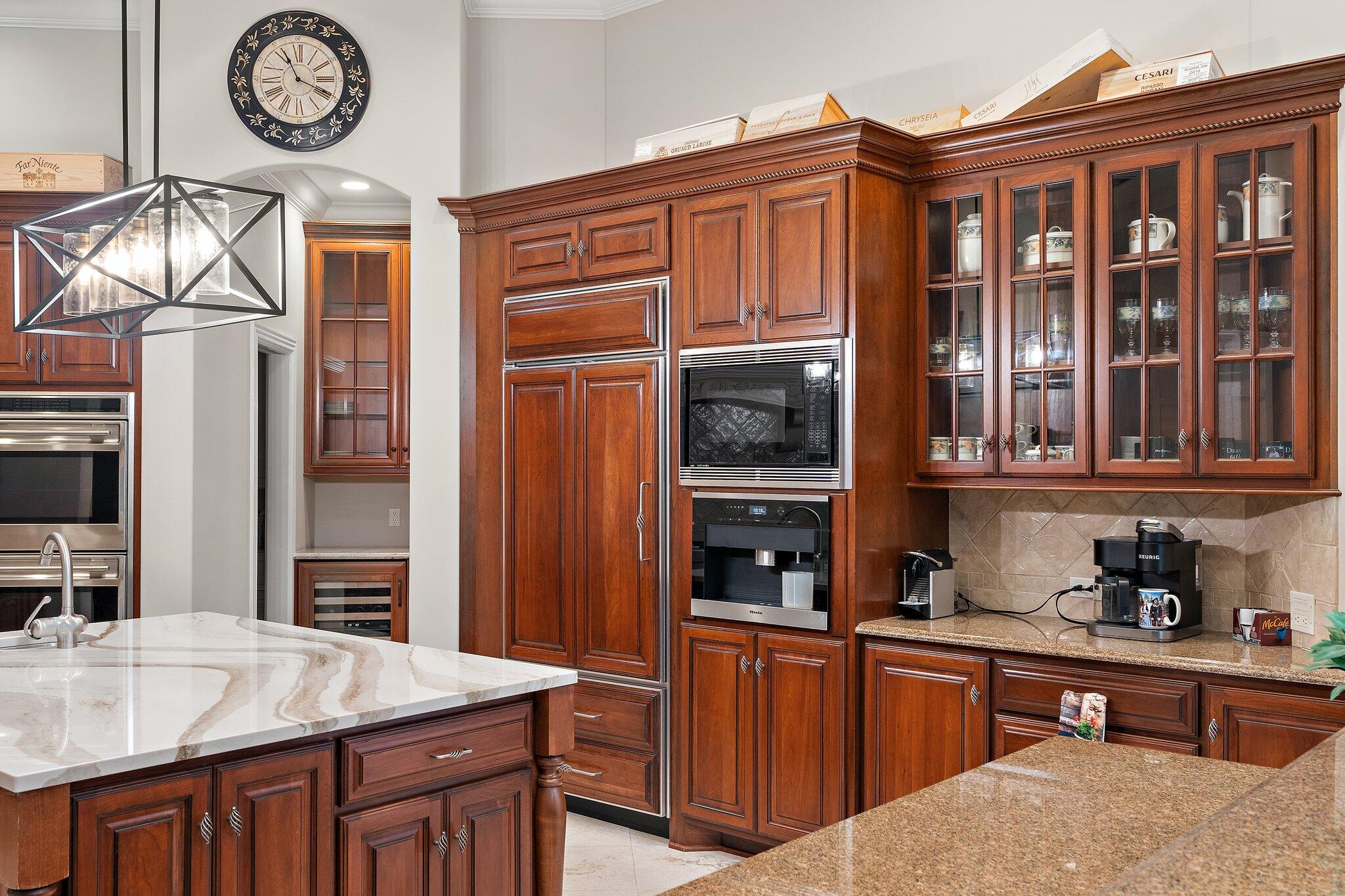 1191 Churchill Lane Crown Point, IN 46307 - Photo 20 of 80 a kitchen with stainless steel appliances granite countertop a refrigerator and a stove top oven