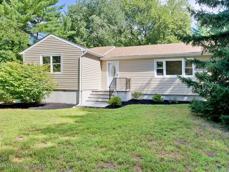 792 Hulses Corner Road Howell, NJ 07731 - Photo 3 of 43 a front view of house with yard and green space