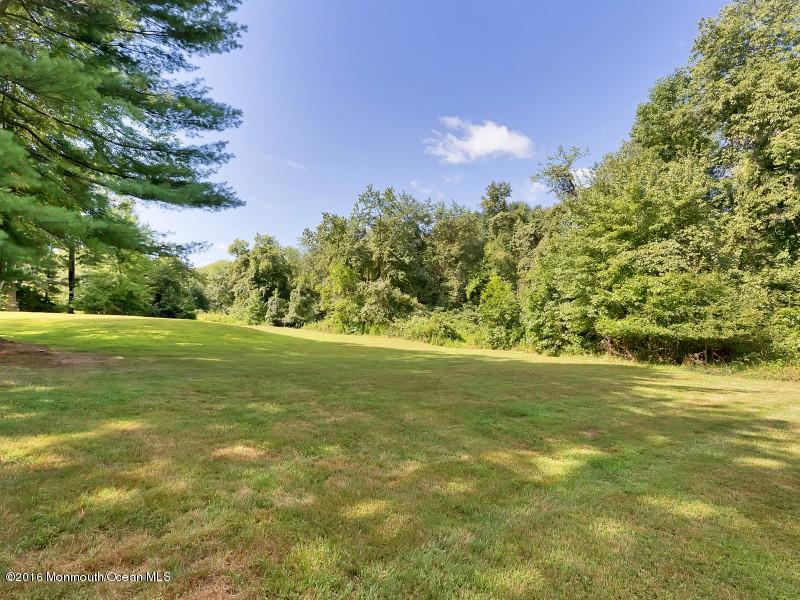 792 Hulses Corner Road Howell, NJ 07731 - Photo 33 of 43 a view of a green yard
