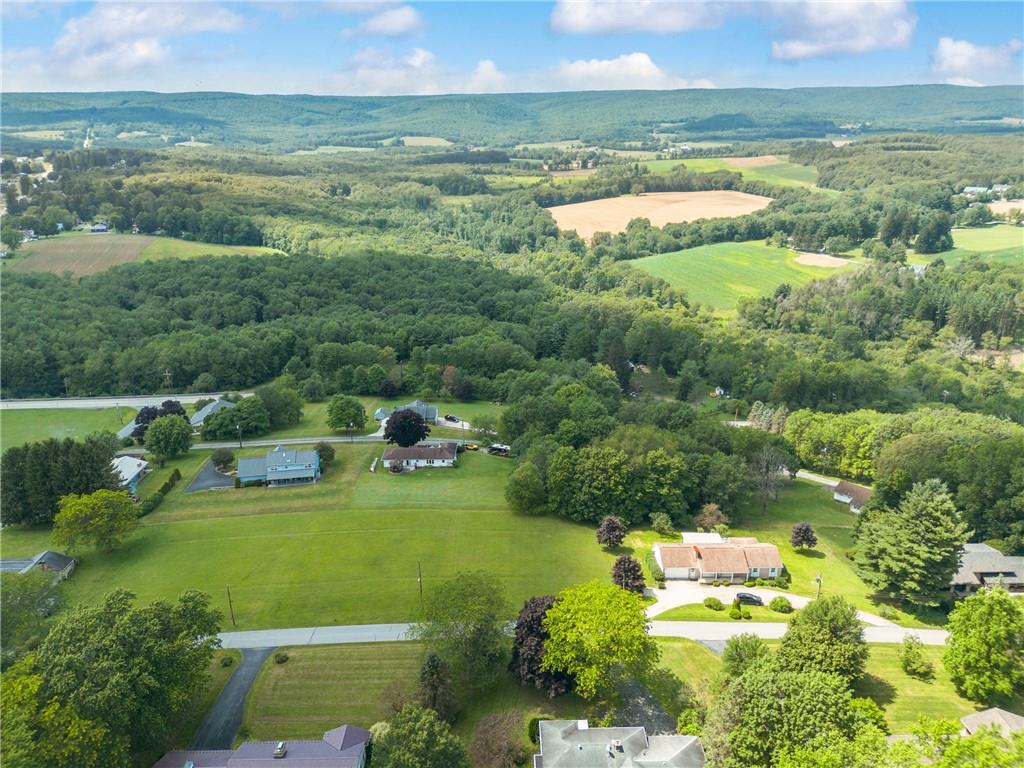 144 White Star Way Jennerstown, PA 15547 - Photo 8 of 17 a view of a lake with a yard