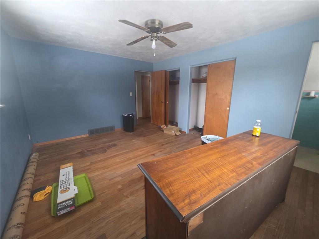 429 Paris Colliers Road Burgettstown, PA 15021 - Photo 17 of 25 a bedroom with a bed and a chandelier