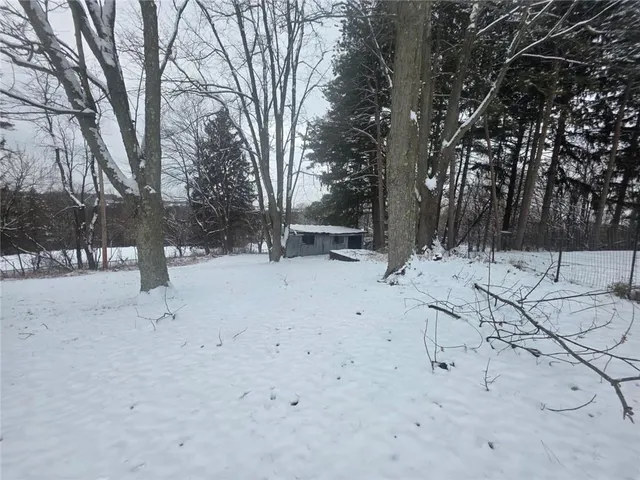 a view of snow on a road